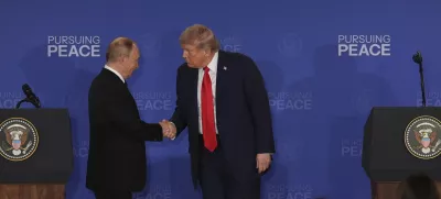 President Donald Trump, right, shakes the hand of Russia's President Vladimir Putin during a joint press conference at Joint Base Elmendorf-Richardson, Alaska, Friday, Aug. 15, 2025. (AP Photo/Jae C. Hong)
