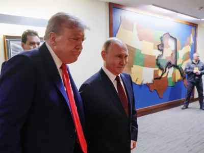 HANDOUT - 15 August 2025, US, Alaska: Russian President Vladimir Putin (R) and US President Donald Trump walk to a joint press conference with US President Donald Trump at Joint Base Elmendorf-Richardson in Alaska. Photo: -/Kremlin/dpa - ATTENTION: editorial use only and only if the credit mentioned above is referenced in full
