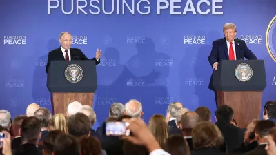 HANDOUT - 15 August 2025, US, Alaska: US President Donald Trump (R) and Russian President Vladimir Putin attend a press conference at Joint Base Elmendorf-Richardson following their meeting in Alaska. Photo: -/Kremlin/dpa - ATTENTION: editorial use only and only if the credit mentioned above is referenced in full