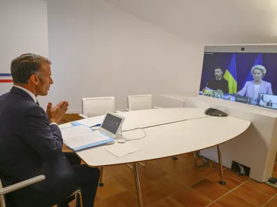 French President Emmanuel Macron attends a video conference with European Commission Ursula van der Leyen and Ukraine's President Volodymyr Zelenskyy as part of the so-called "coalition of the willing"Sunday, Aug. 17, 2025 at the Fort de Bregancon in Bormes-les-Mimosas, southern France. (AP Photo/Philippe Magoni, Pool)
