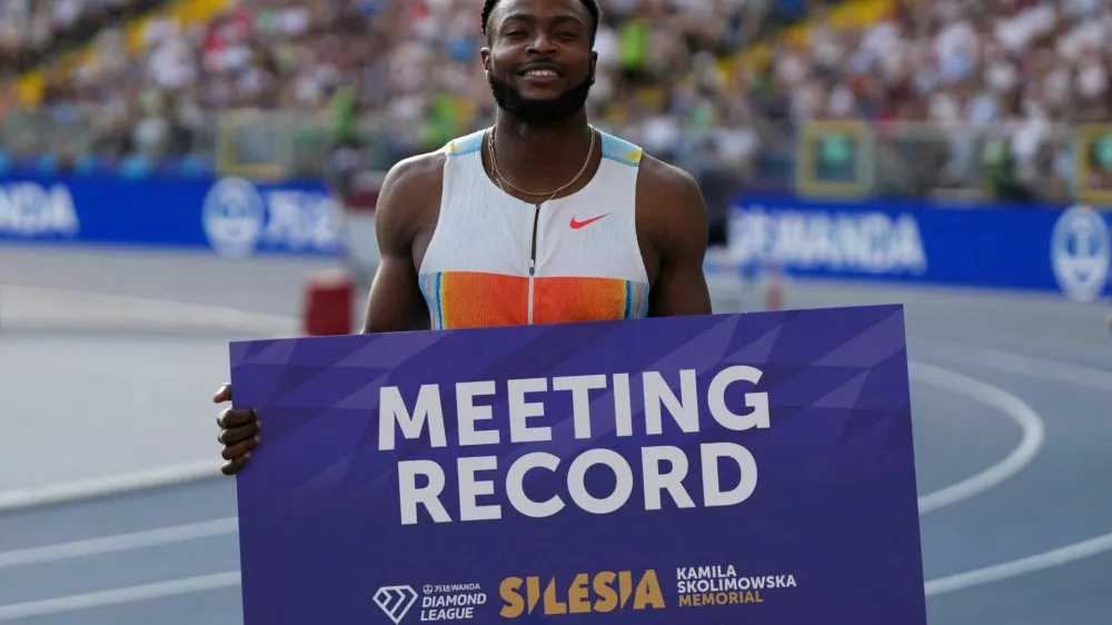 FILE PHOTO: Athletics - Diamond League - Silesia - Silesian Stadium, Chorzow, Poland - August 16, 2025 Jamaica's Kishane Thompson celebrates after setting a new Meeting Record to win the Men's 100m Final REUTERS/Aleksandra Szmigiel/File Photo
