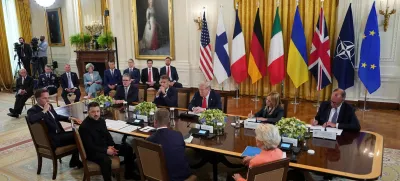 Ukrainian President Volodymyr Zelenskiy speaks during a meeting with U.S. President Donald Trump, German Chancellor Friedrich Merz, French President Emmanuel Macron, British Prime Minister Keir Starmer, Italian Prime Minister Giorgia Meloni, Finland's President Alexander Stubb, NATO Secretary General Mark Rutte and European Commission President Ursula von der Leyen amid negotiations to end the Russian war in Ukraine, at the White House in Washington, D.C., U.S., August 18, 2025. REUTERS/Alexander Drago