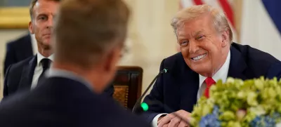 U.S. President Donald Trump meets French President Emmanuel Macron and Finland's President Alexander Stubb, amid negotiations to end the Russian war in Ukraine, at the White House in Washington, D.C., U.S., August 18, 2025. REUTERS/Al Drago