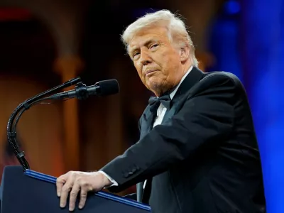 U.S. President Donald Trump attends the National Republican Congressional Committee (NRCC) dinner at the National Building Museum in Washington, D.C., U.S., April 8, 2025. REUTERS/Nathan Howard
