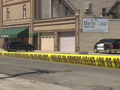 This image from video provided by KRDO13 shows Davis Mortuary in Pueblo, Colo., on Thursday, Aug. 21, 2025, where state inspectors found decomposing bodies behind a hidden door. (KRDO13 via AP)