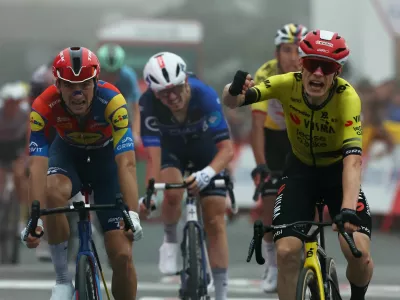 Cycling - Vuelta a Espana - Stage 2 - Alba to Limone Piemonte - Limone Piemonte, Italy - August 24, 2025 Team Visma | Lease A Bike's Jonas Vingegaard celebrates winning stage 2 REUTERS/Manon Cruz