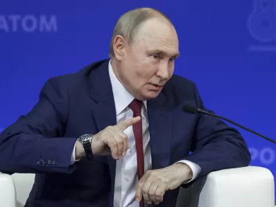 Russian President Vladimir Putin gestures as he speaks during a meeting with nuclear industry personnel at the Russian Federal Nuclear Center - All-Russian Scientific Research Institute of Experimental Physics (RFNC-VNIIEF), in Sarov, Nizhny Novgorod region, Russia, Friday, Aug. 22, 2025. (Gavriil Grigorov, Sputnik, Kremlin Pool Photo via AP)