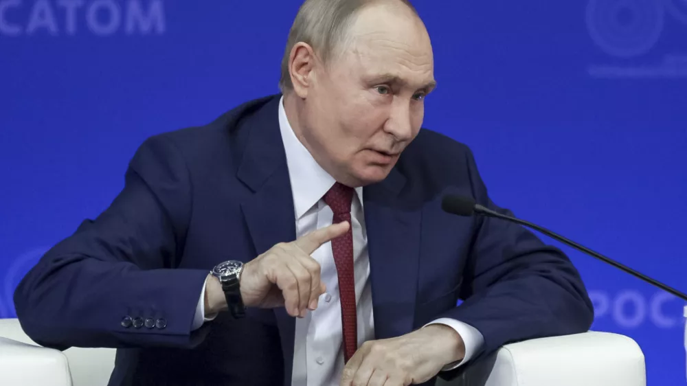 Russian President Vladimir Putin gestures as he speaks during a meeting with nuclear industry personnel at the Russian Federal Nuclear Center - All-Russian Scientific Research Institute of Experimental Physics (RFNC-VNIIEF), in Sarov, Nizhny Novgorod region, Russia, Friday, Aug. 22, 2025. (Gavriil Grigorov, Sputnik, Kremlin Pool Photo via AP)