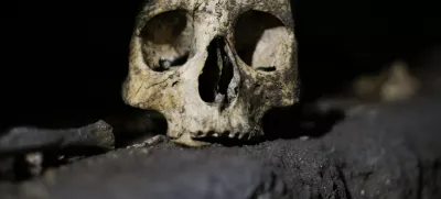 ﻿A skull is pictured inside the catacomb of Priscilla in Rome November 19, 2013. The catacomb, used for Christian burials from the late 2nd century through the 4th century, reopened on Tuesday to the public after years of restoration. The complex will also be viewable in a dedicated section of Google Maps, according to a Vatican press release. REUTERS/Max Rossi (ITALY - Tags: SOCIETY TRAVEL)