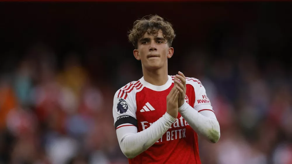 Soccer Football - Premier League - Arsenal v Leeds United - Emirates Stadium, London, Britain - August 23, 2025 Arsenal's Max Dowman celebrates after the match Action Images via Reuters/Andrew Couldridge 
