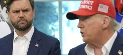 Vice President JD Vance looks on as President Donald Trump speaks in the Oval Office of the White House, Friday, Aug. 22, 2025, in Washington. (AP Photo/Jacquelyn Martin)