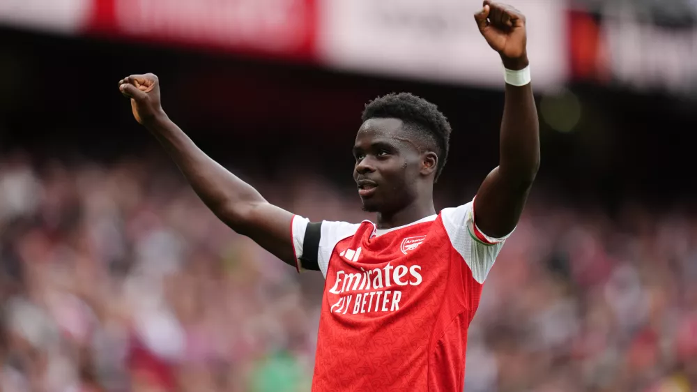 23 August 2025, United Kingdom, London: Arsenal's Bukayo Saka celebrates scoring his side's second goal during the English Premier League soccer match between Arsenal and Leeds United at the Emirates Stadium. Photo: John Walton/PA Wire/dpa
