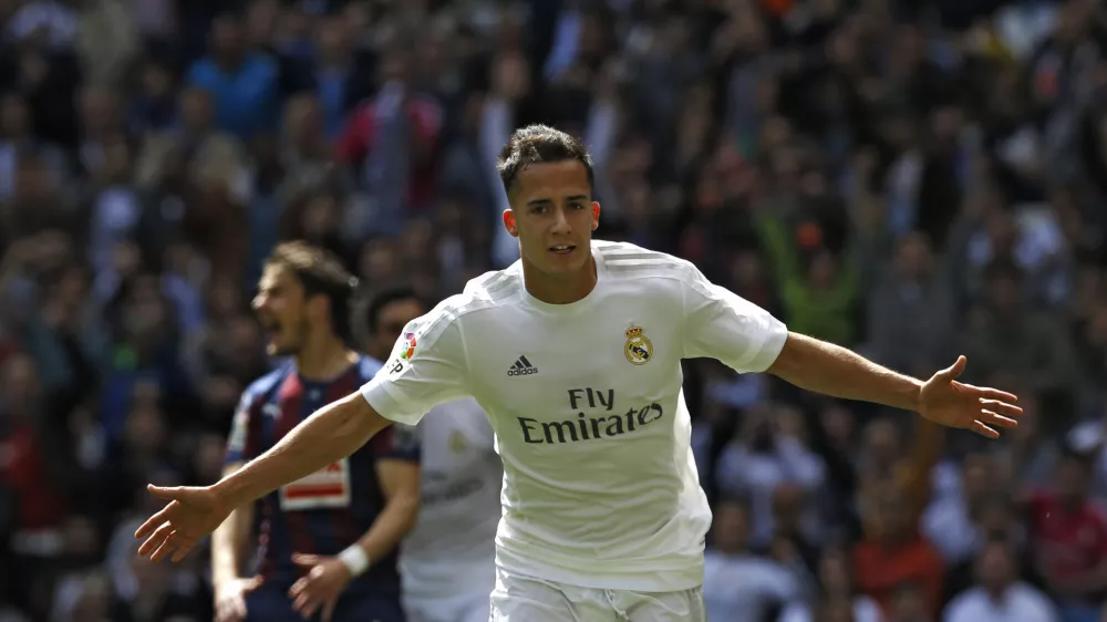 FILE - Real Madrid's Lucas Vazquez celebrates after scoring his side's second goal against Eibar during the Spanish La Liga soccer match between Real Madrid and Eibar at the Santiago Bernabeu stadium in Madrid, Saturday, April 9, 2016. (AP Photo/Francisco Seco, File)
