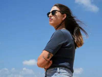 Doron Steinbrecher, a released hostage, who was held by Hamas in Gaza for 471 days, poses for a photograph, following an interview with Reuters, in Kibbutz Shefayim, Israel, August 25, 2025. REUTERS/Miro Maman