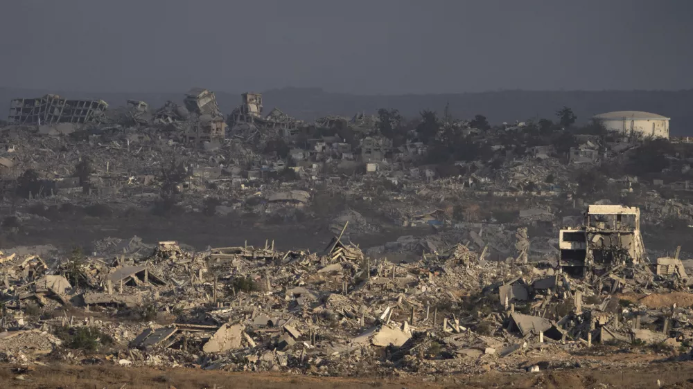 Buildings that were destroyed during the Israeli ground and air operations stand in the Gaza Strip as seen from southern Israel, Thursday, Aug. 28, 2025. (AP Photo/Maya Levin)