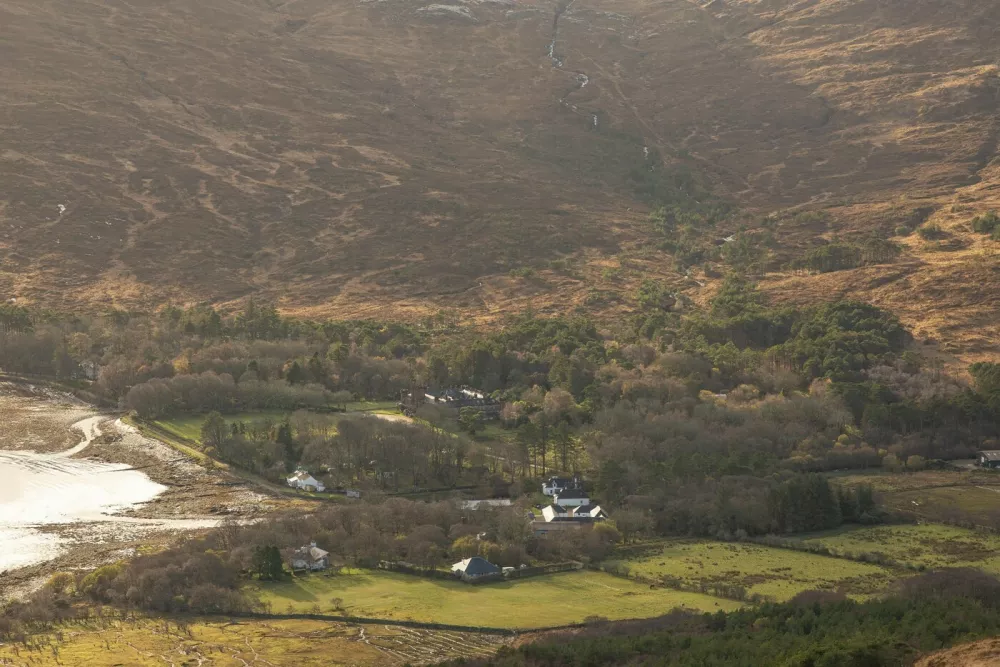 Kinloch Castle. See SWNS story SWOCcastle. July 29, 2021.One of Prince Charles' favourite castles is looking for a new owner to save it from ruin as the iconic landmark crumbles in need of repair. Kinloch Castle on the Island of Rum in Scotland is on the market for a new owner who could put the money required into fixing up the crumbling castle. With a nominal value of just £1, this is an extremely rare opportunity to take ownership of a 120-year-old castle that Prince Charles himself has been passionate about saving. Repairs on the crumbling turreted red-sandstone house are estimated at an eye-watering £20 million to restore the castle to it's former glory. A private individual or a charity, foundation or private company who can provide such an amount for the castle repairs are in with a chance of owning the incredible house. Any new hopeful owners will have to prove that they have the resources to save this Category A landmark and show plans for bettering the future of the small isle where the castle sits.,Image: 624152993, License: Rights-managed, Restrictions: This image is not available for use at a stock rate unless with prior agreement. This image hereby disclosed to your organisation is so disclosed on the condition that your organisation will take all steps necessary to ensure that any identifiable personal data is processed in full compliance with the Data Protection Act 2018follow us on twitter - @swnsbrowse our website - swns.comemail pix@swns.com, Model Release: no