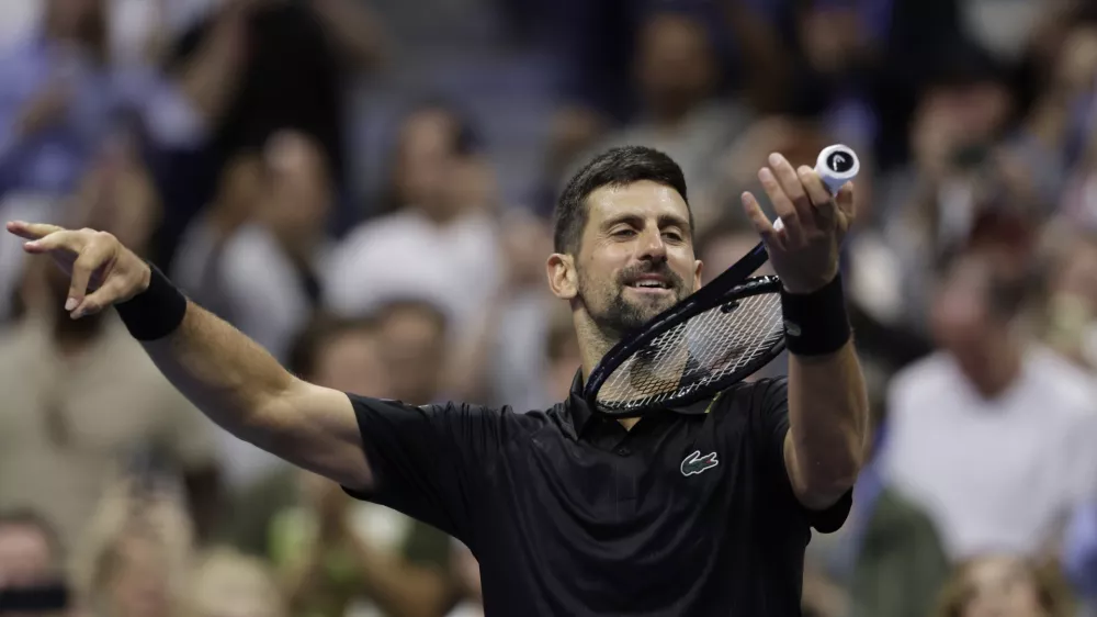 Novak Djokovic, of Serbia, reacts following a third round of the U.S. Open tennis championships, Friday, Aug. 29, 2025, in New York. (AP Photo/Adam Hunger)