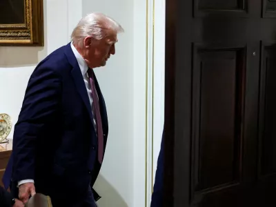 FILE PHOTO: U.S. President Donald Trump leaves, following a cabinet meeting, at the White House in Washington, D.C., U.S., August 26, 2025. REUTERS/Jonathan Ernst/File Photo