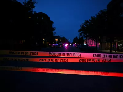 Emergency police lights illuminate a tape barrier near the scene of an attack that injured multiple people, in Boulder, Colorado, U.S. June 1, 2025. REUTERS/Mark Makela