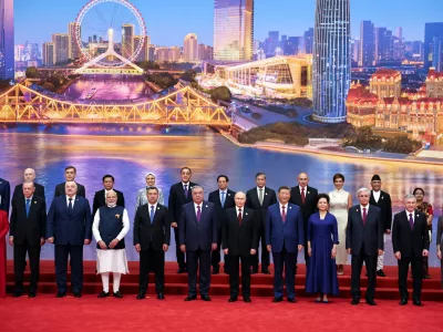 Leaders and officials, including Chinese President Xi Jinping and Russian President Vladimir Putin, attend a photo ceremony at the Shanghai Cooperation Organisation (SCO) summit in Tianjin, China August 31, 2025. Sputnik/Alexander Kazakov/Pool via REUTERS ATTENTION EDITORS - THIS IMAGE WAS PROVIDED BY A THIRD PARTY.