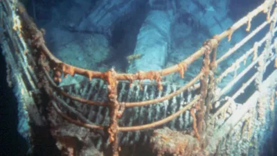 The bow of the ill-fated Titanic looms out of the darkness on the ocean floor 12,500 feet below the surface of the North Atlanic where it went down after a collision with an iceberg April 15, 1912. (AP Photo)