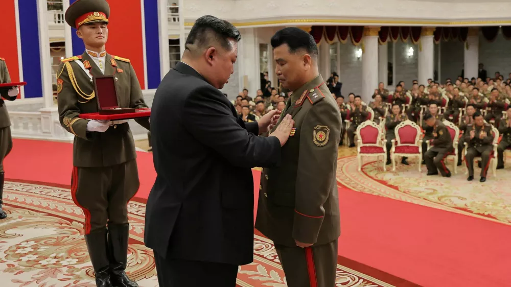 North Korean leader Kim Jong attends a national commendation ceremony for the commanders and fighters of the Korean People's Army's overseas operations unit, at the headquarters of the Central Committee of the Korean Workers' Party, in Pyongyang, North Korea, in this photo released on August 22, 2025 by North Korea's Korean Central News Agency (KCNA). KCNA via REUTERS ATTENTION EDITORS - THIS IMAGE WAS PROVIDED BY A THIRD PARTY. REUTERS IS UNABLE TO INDEPENDENTLY VERIFY THIS IMAGE. NO THIRD PARTY SALES. SOUTH KOREA OUT. NO COMMERCIAL OR EDITORIAL SALES IN SOUTH KOREA.