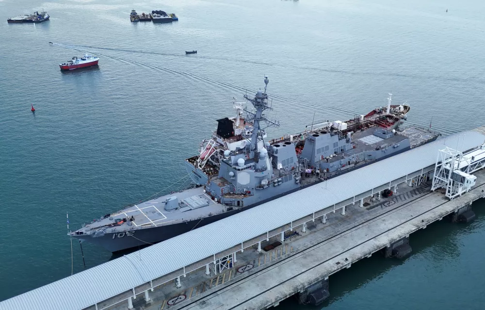 A drone view of the U.S. Navy guided missile destroyer USS Sampson DDG-102 docked near the entrance to the Panama Canal, amid a large buildup of U.S. naval forces in and around the Southern Caribbean, in Panama City, Panama, August 30, 2025. REUTERS/Mauricio Valenzuela