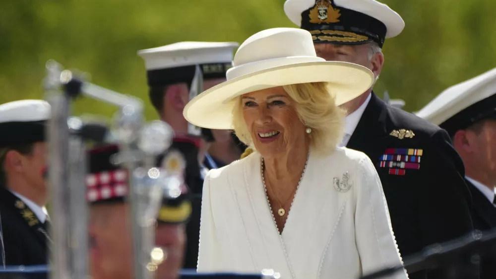 FILE - Britain's Queen's Camilla arrives for the commemoration of the 80th Anniversary of VJ Day at The National Memorial Arboretum on Aug. 15, 2025, in Alrewas, England. (Christopher Furlong/Pool Photo via AP, File)
