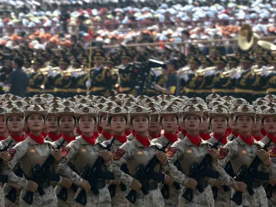 Chinese militia members march during a military parade to mark the 80th anniversary of the end of World War Two, in Beijing, China, September 3, 2025. REUTERS/Maxim Shemetov   TPX IMAGES OF THE DAY