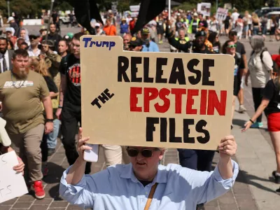 Anti-Trump demonstrators march near the U.S. Capitol, protesting against issues including the Jeffrey Epstein case and the increased presence of military and federal law enforcement in the D.C area ordered by U.S President Donald Trump, in Washington, D.C., U.S. September 2, 2025. REUTERS/Jonathan Ernst
