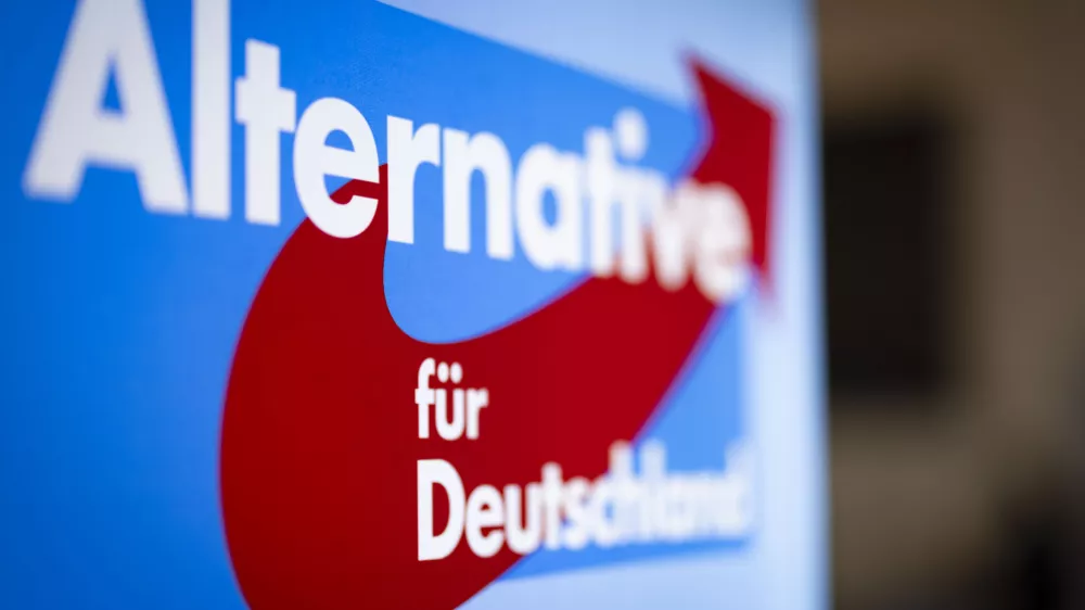 FILED - 24 February 2024, North Rhine-Westphalia, Marl: A view of a stand with the words "Alternative for Germany" and the AfD logo. Photo: Christoph Reichwein/dpa