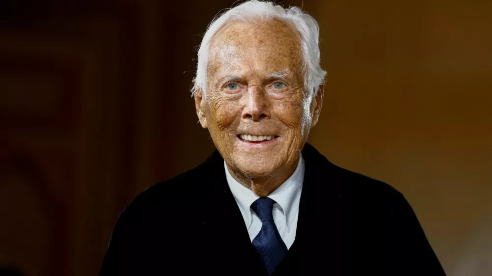 FILE PHOTO: Designer Giorgio Armani appears at the end of his Haute Couture Spring/Summer 2025 collection show for Giorgio Armani Prive in Paris, France, January 28, 2025. REUTERS/Sarah Meyssonnier/File Photo