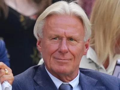 FILE - Tennis legend Bjorn Borg sits in the Royal Box to watch Aryna Sabalenka, of Belarus, and Amanda Anisimova,of the United States,. to play in a women's singles semifinal match at the Wimbledon Tennis Championships in London, Thursday, July 10, 2025. (AP Photo/Kirsty Wigglesworth, File)