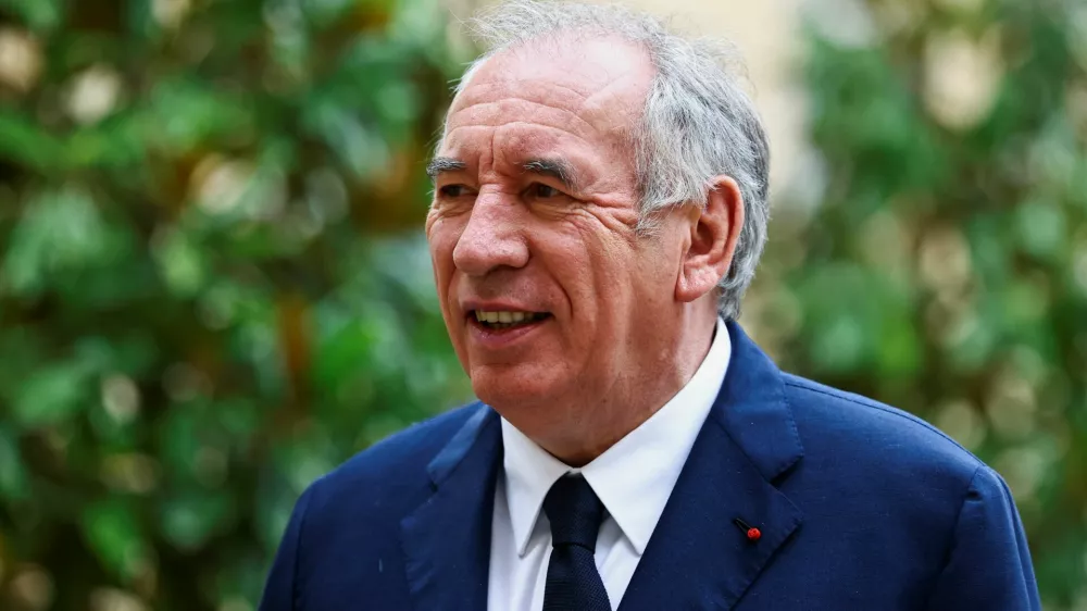 French Prime Minister Francois Bayrou arrives for a series of consultations with political parties, a week before a confidence vote he is seeking from the National Assembly on the budget issue, at the Hotel Matignon in Paris, France, September 3, 2025. REUTERS/Sarah Meyssonnier