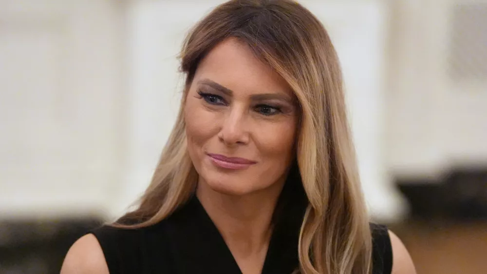 First lady Melania Trump attends a dinner with President Donald Trump in the State Dinning Room of the White House, Thursday, Sept. 4, 2025, in Washington. (AP Photo/Alex Brandon)