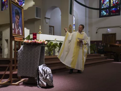 The Rev. Ed Howe, the pastor at Blessed Carlo Acutis Parish in Chicago's Northwest Side, leads a Mass themed for Acutis, who will be canonized a saint by Pope Leo XIV, at the parish church on Wednesday, Sept. 3, 2025, in Chicago. (AP Photo/Jessie Wardarski)