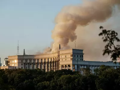 Smoke rises over a building of the Ukrainian government headquarters, after Russian drone and missile strikes, amid Russia's attack on Ukraine, in Kyiv, Ukraine September 7, 2025. REUTERS/Serhii Korovainyi