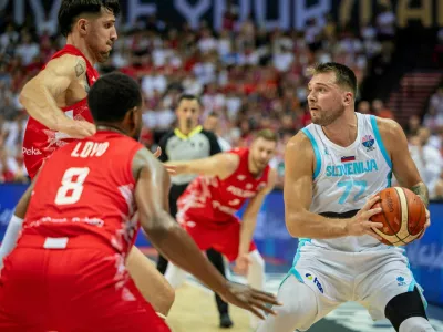 Basketball - FIBA EuroBasket 2025 - Group Phase - Slovenia v Poland - Spodek, Katowice, Poland - August 28, 2025 Slovenia's Luka Doncic in action Grzegorz Celejewski/Agencja Wyborcza.pl via REUTERS ATTENTION EDITORS - THIS IMAGE WAS PROVIDED BY A THIRD PARTY. POLAND OUT. NO COMMERCIAL OR EDITORIAL SALES IN POLAND.