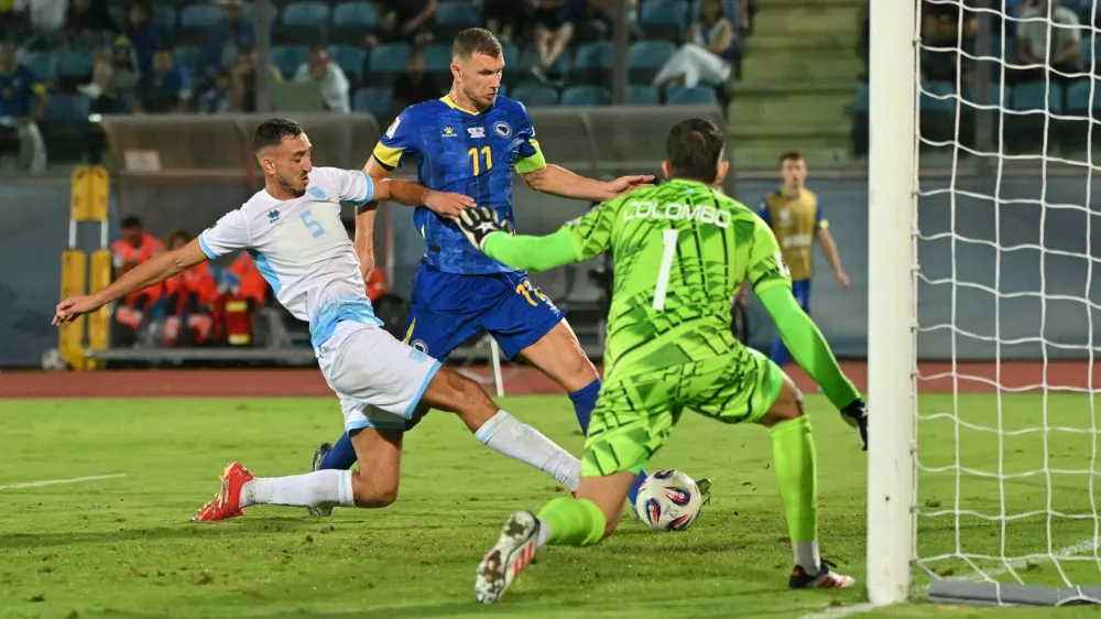 Soccer Football - World Cup - UEFA Qualifiers - Group H - San Marino v Bosnia and Herzegovina - San Marino Stadium, Serravalle, San Marino - September 6, 2025 Bosnia and Herzegovina's Edin Dzeko scores their second goal REUTERS/Alberto Lingria