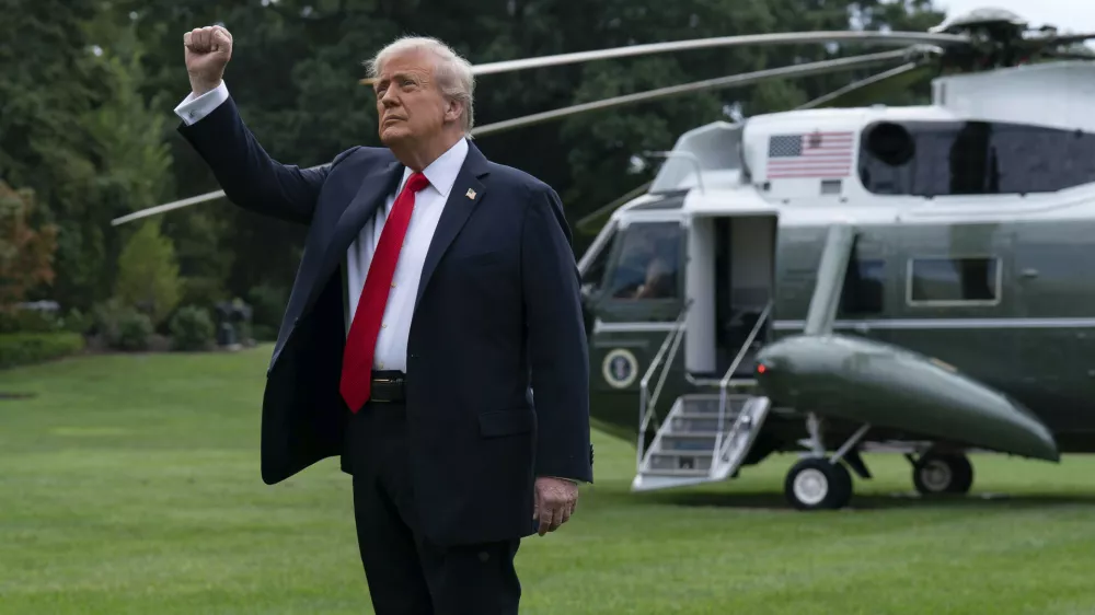 President Donald Trump gestures as leaves the White House in Washington, Sunday, Sept. 7, 2025. (AP Photo/Jose Luis Magana)