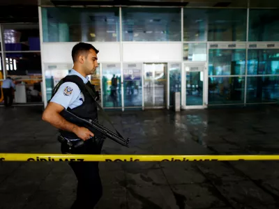 ﻿A police officer patrols at Turkey's largest airport, Istanbul Ataturk, following yesterday's blast June 29, 2016. REUTERS/Osman Orsal