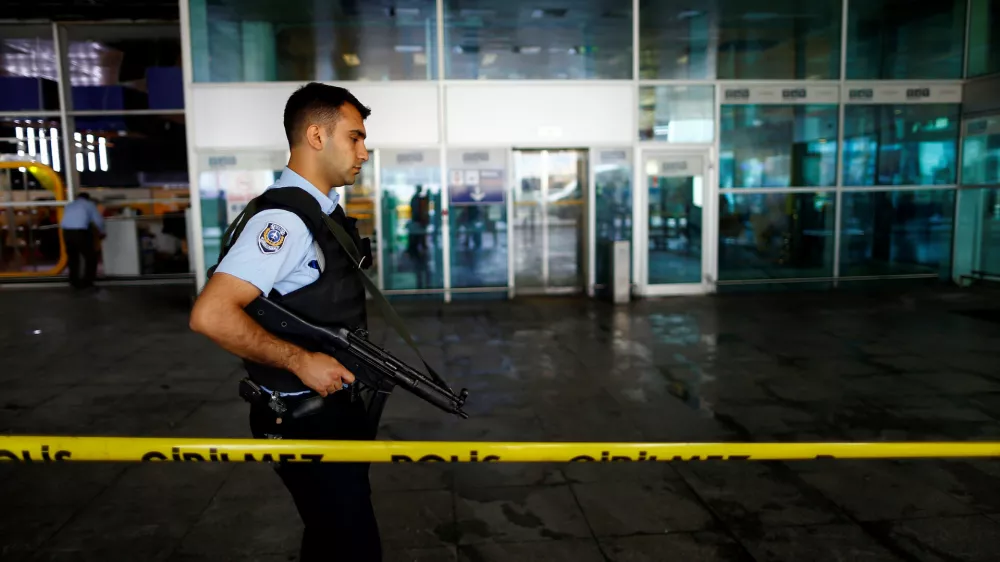 ﻿A police officer patrols at Turkey's largest airport, Istanbul Ataturk, following yesterday's blast June 29, 2016. REUTERS/Osman Orsal