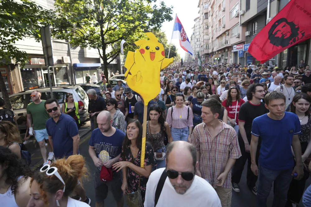 Led by university students, people attend a protest against increasing police brutality in Belgrade, Serbia, Monday, Sept. 8, 2025. (AP Photo/Darko Vojinovic)