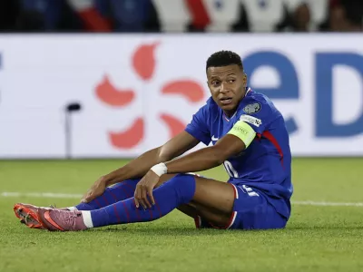Soccer Football - World Cup - UEFA Qualifiers - Group D - France v Iceland - Parc des Princes, Paris, France - September 9, 2025 France's Kylian Mbappe reacts REUTERS/Benoit Tessier