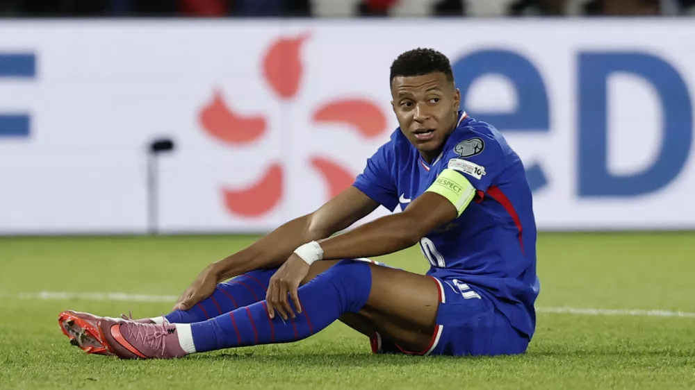 Soccer Football - World Cup - UEFA Qualifiers - Group D - France v Iceland - Parc des Princes, Paris, France - September 9, 2025 France's Kylian Mbappe reacts REUTERS/Benoit Tessier
