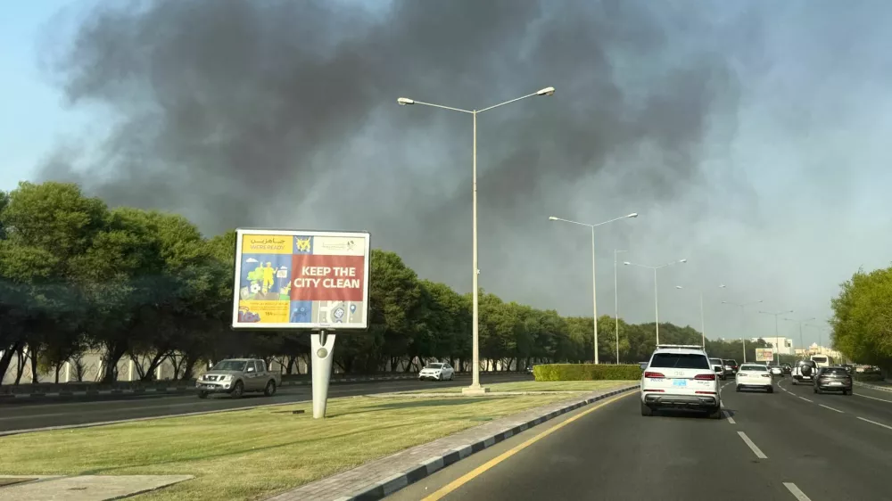 Smoke rises after several blasts were heard in Doha, Qatar, September 9, 2025. REUTERS/Ibraheem Abu Mustafa