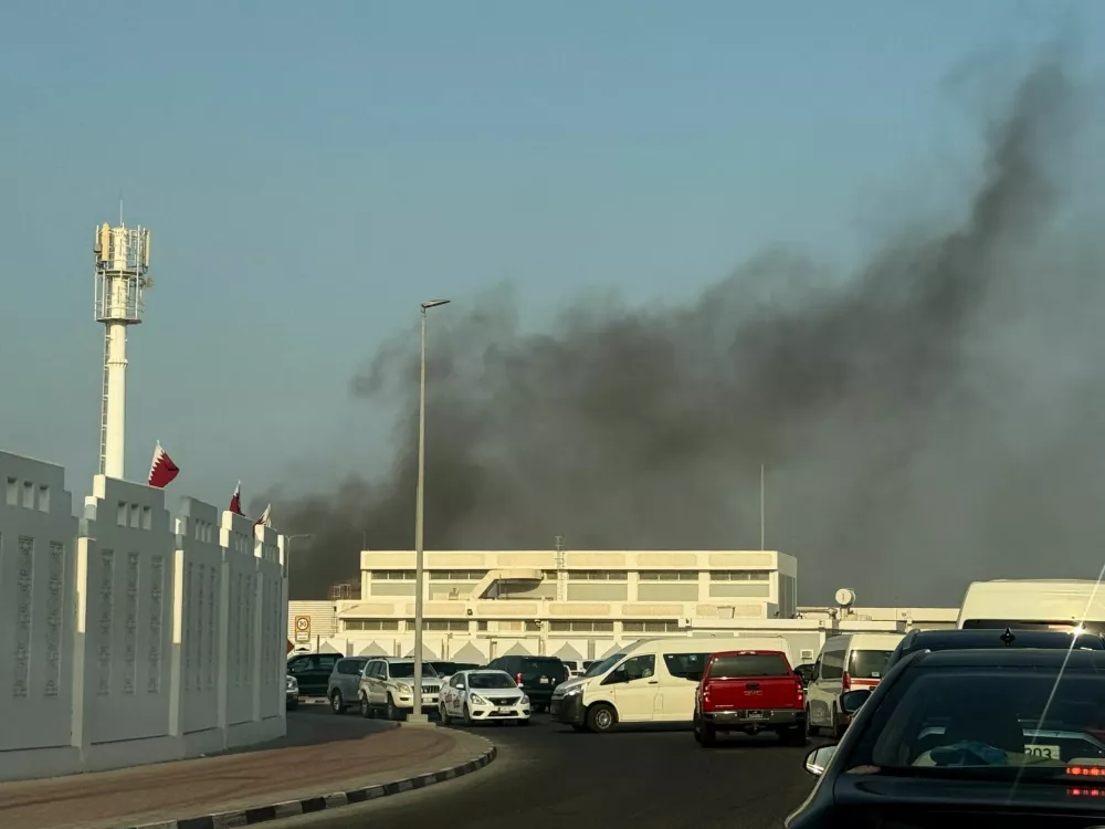Smoke rises after several blasts were heard in Doha, Qatar, September 9, 2025. REUTERS/Ibraheem Abu Mustafa