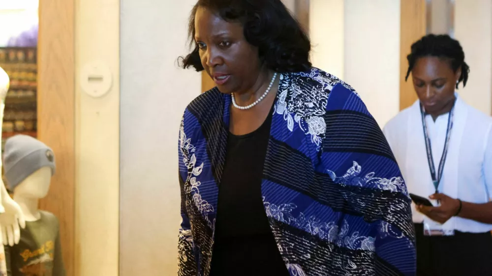 FILE PHOTO: Federal Reserve Governor Lisa Cook attends the Federal Reserve Bank of Kansas City's 2025 Jackson Hole economic symposium, "Labor Markets in Transition: Demographics, Productivity, and Macroeconomic Policy" in Jackson Hole, Wyoming, U.S., August 23, 2025. REUTERS/Jim Urquhart/File Photo