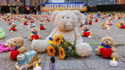 IMAGE DISTRIBUTED FOR AVAAZ.ORG - Avaaz members and Ukrainian refugees install thousands of kids' teddy bears and toys at Schuman Roundabout in front of the European Commission to highlight the reported abduction of thousands of Ukrainian children by Russia on Thursday Feb,23, 2022 in Brussels. Attendants call on EU, US, UK and Canadian leaders to sanction 14 Russian officials who are among those allegedly responsible for the abductions. (Olivier Matthys/AP Images for Avaaz.org)