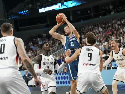Basketball - FIBA EuroBasket 2025 - Quarter Finals - Germany v Slovenia - Xiaomi Arena, Riga, Latvia - September 10, 2025 Slovenia's Aleksej Nikolic in action REUTERS/Ints Kalnins